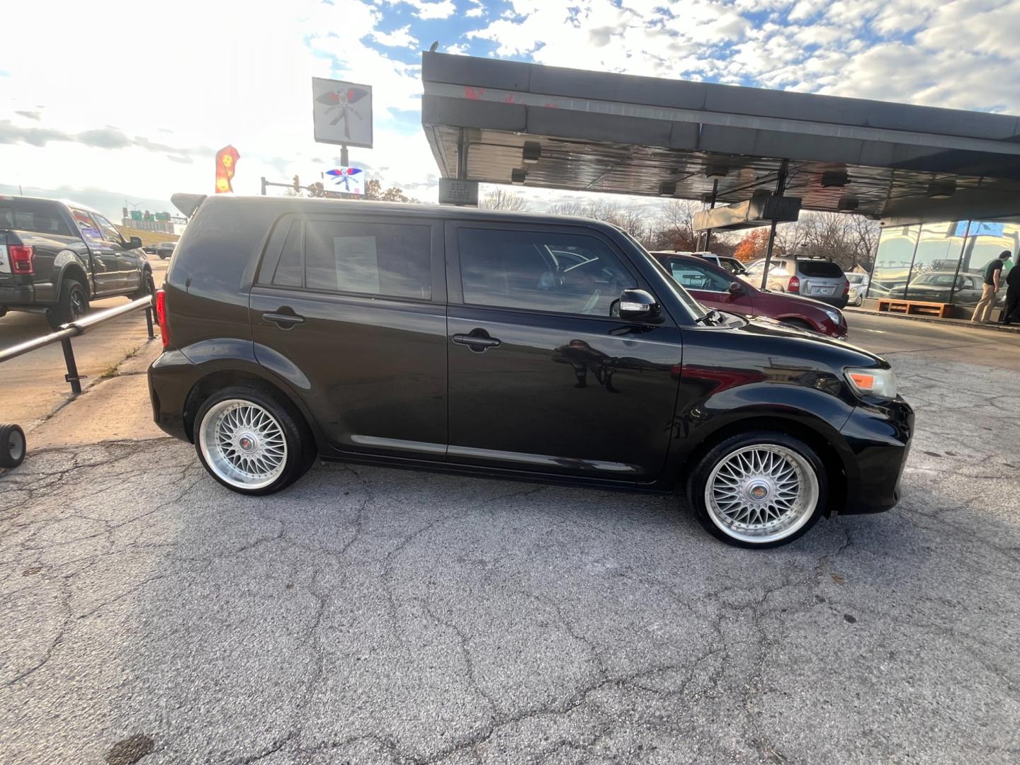 2015 BLACK SCION XB BASE 5-Door Wagon 5-Spd MT (JTLZE4FEXFJ) with an 2.4L L4 DOHC 16V engine, 5-Speed Manual transmission, located at 8101 E. Skelly Dr., Tulsa, OK, 74129, (918) 592-3593, 36.121891, -95.888802 - Photo#3